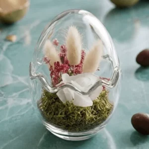 ovo decorativo em vidro com flores secas – arranjo floral elegante